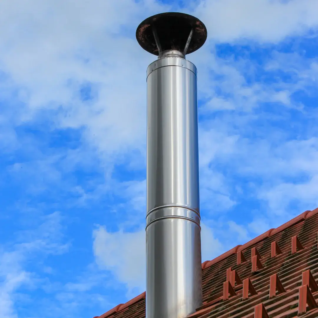 salida del tubo de chimenea al exterior